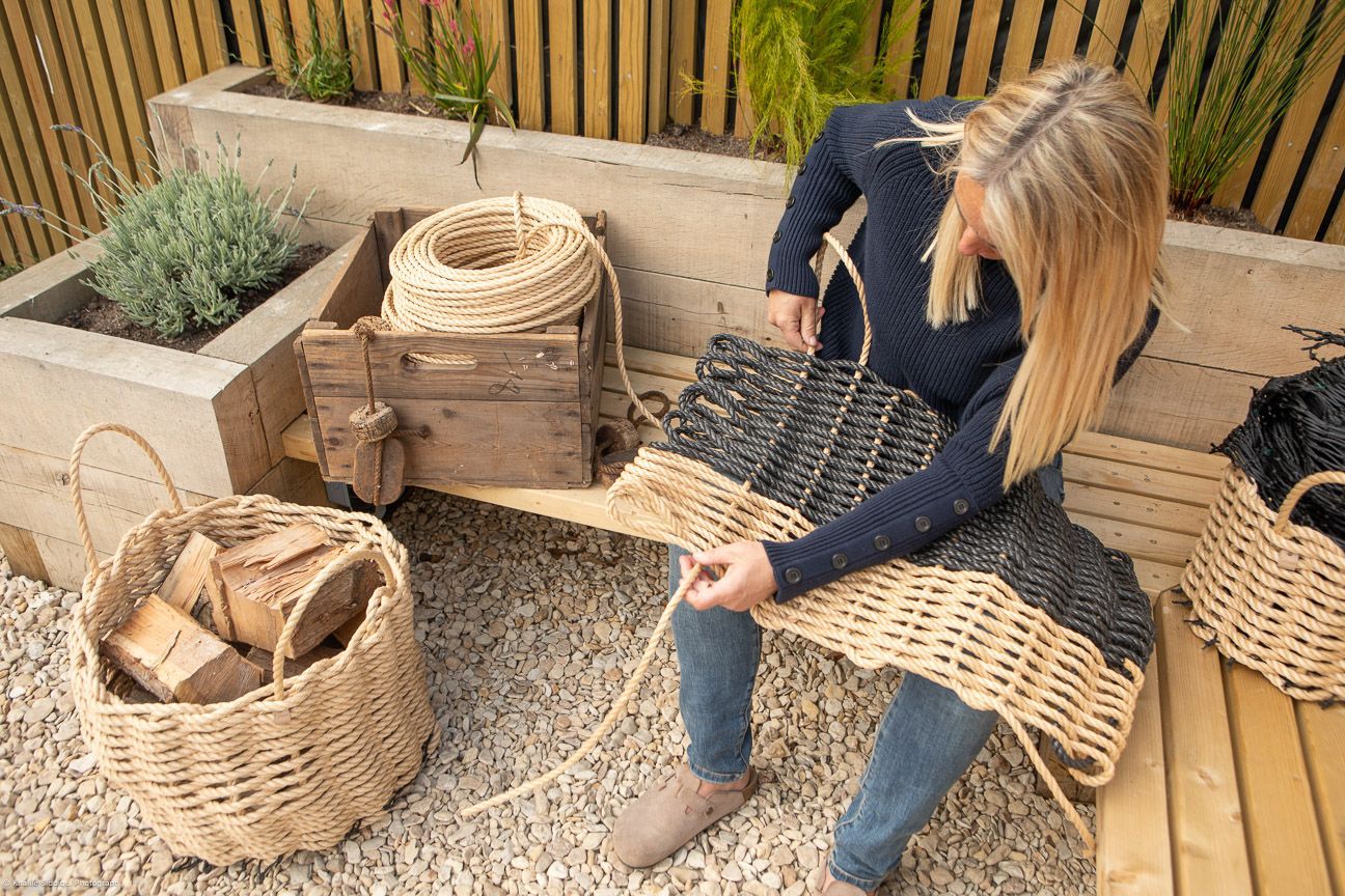 Founder Zoe handweaving traditional Cornish rope homeware for Lovan.
